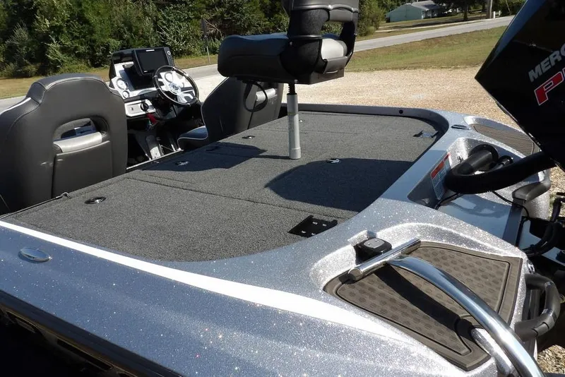 Slide: The Image of 2023 Nitro Z19 boat interior with steering console and seating. - 11