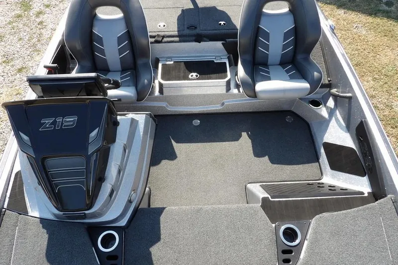 Slide: The Image of 2023 Nitro Z19 boat interior with dual seats and steering console. - 19