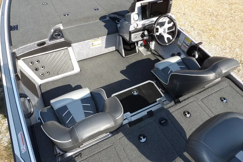 Slide: The Image of 2023 Nitro Z19 boat interior with dual seats and steering console. - 20