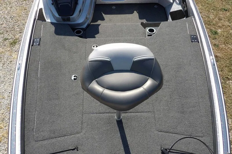 Slide: The Image of 2023 Nitro Z19 boat deck with a gray swivel seat and carpeted flooring. - 30