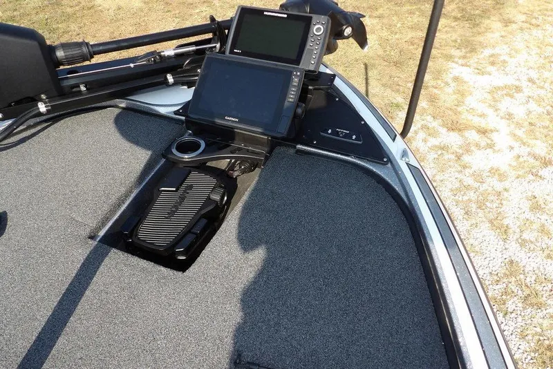 Slide: The Image of 2023 Nitro Z19 boat deck with navigation equipment and foot pedal. - 35