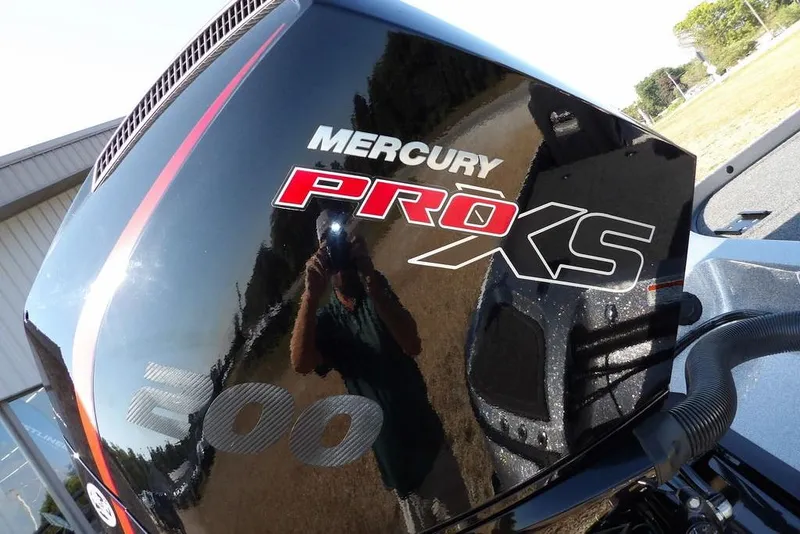 Slide: The Image of Mercury Pro XS engine on 2023 Nitro Z19 boat, reflecting surroundings. - 37