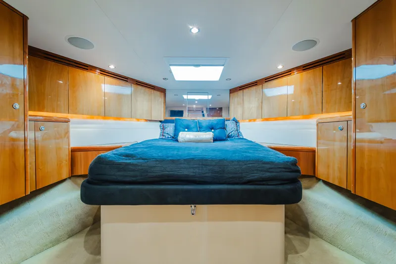 Slide: The Image of Luxurious cabin interior of 2005 Hatteras Convertible 60 yacht with elegant wood finish. - 27