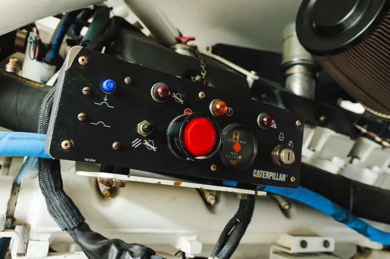 Slide: The Image of Engine control panel of a 2005 Hatteras Convertible 60 yacht with Caterpillar components. - 45