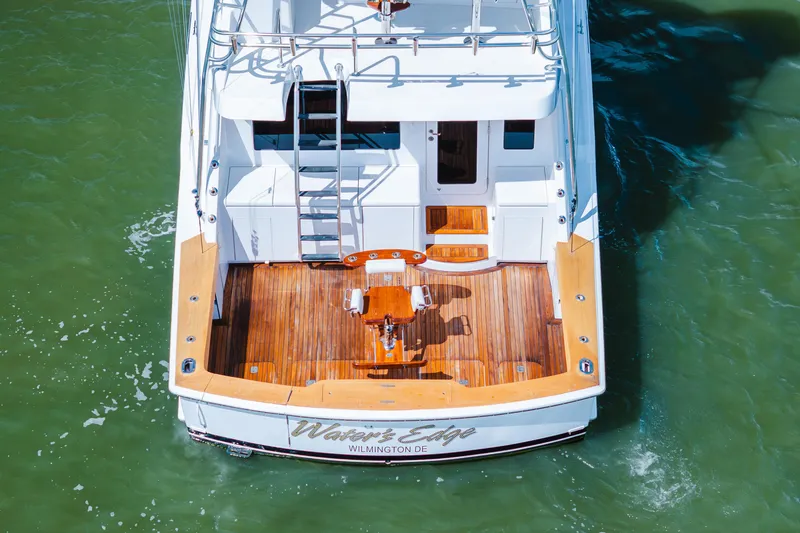 Slide: The Image of 2005 Hatteras Convertible 60 yacht with wooden deck, Wilmington DE. - 55