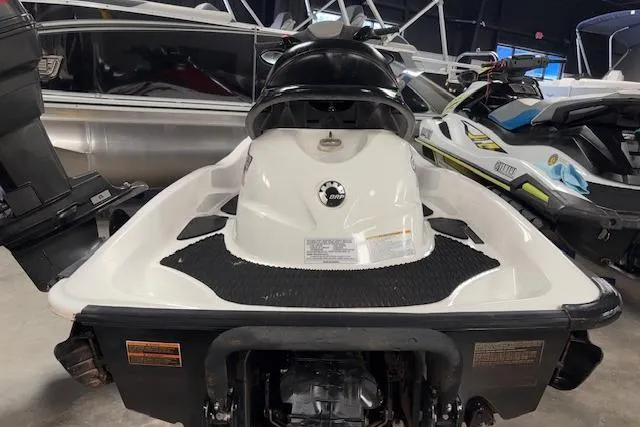 Slide: The Image of 2008 Sea-Doo GTI SE 130 jet ski, rear view in showroom setting. - 5
