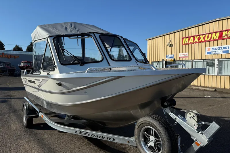 The Image of 2026 Thunder Jet 185 Luxor boat on trailer outside dealership. - 0