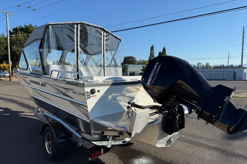 Slide: The Image of 2026 Thunder Jet 185 Luxor boat with Mercury outboard motor on a trailer. - 3
