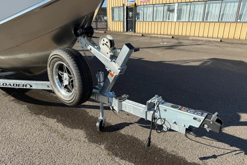 Slide: The Image of Trailer for 2026 Thunder Jet 185 Luxor boat parked on asphalt. - 6