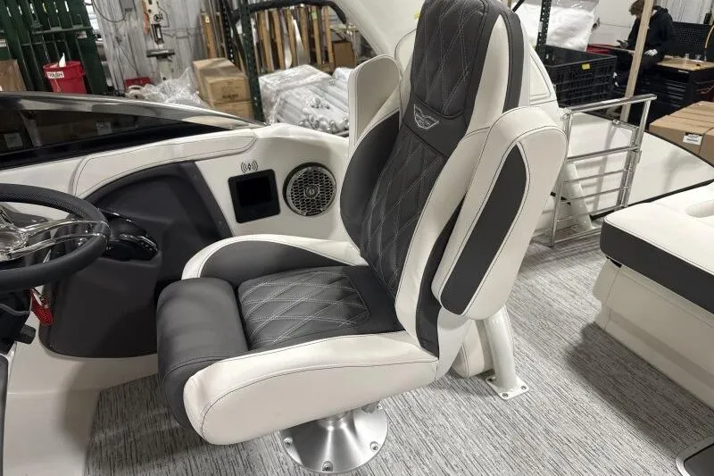 Slide: The Image of Luxury captain's chair in 2025 Bennington 27QXSBWAT2 boat, featuring elegant design and premium materials. - 9