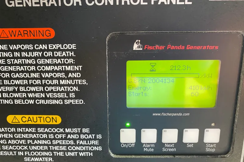 Slide: The Image of Fischer Panda generator control panel on 2022 Grady-White Express 370 boat. - 12