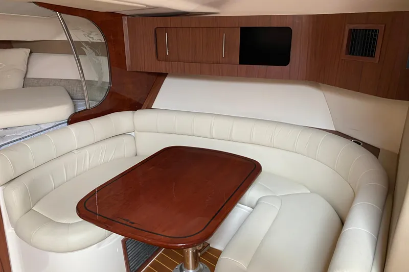 Slide: The Image of Open storage compartment on 2022 Grady-White Express 370 boat, showcasing spacious interior. - 26
