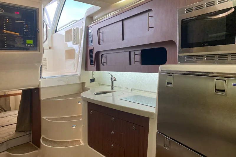 Slide: The Image of 2022 Grady-White Express 370 boat warning label and hardware detail. - 31