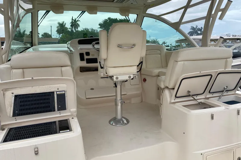 Slide: The Image of 2022 Grady-White Express 370 boat interior with helm and seating area. - 5