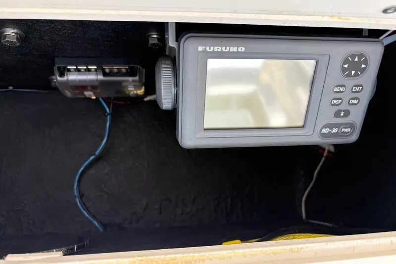 Slide: The Image of Furuno marine electronics in a 2005 Carolina Classic 25 boat dashboard. - 7