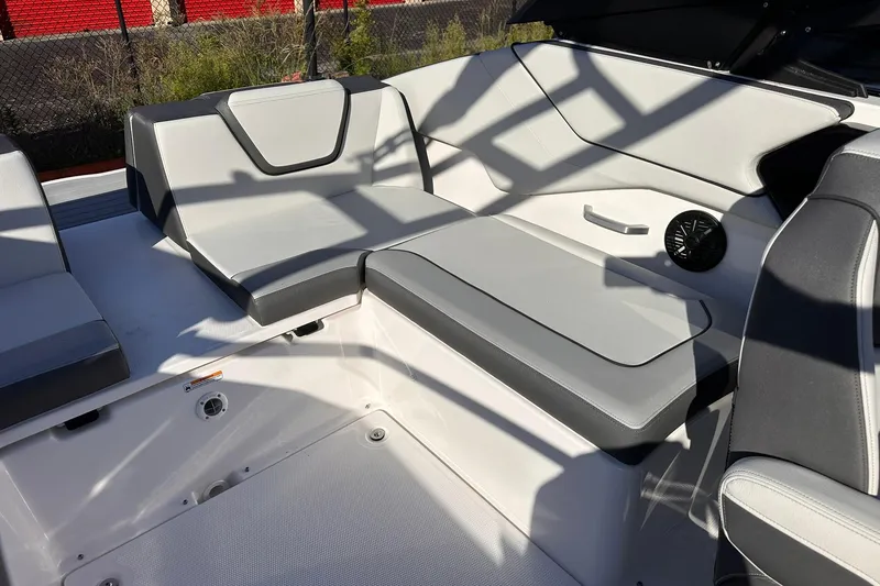 Slide: The Image of 2025 Yamaha Boats AR250 interior seating with modern design and comfortable upholstery. - 15