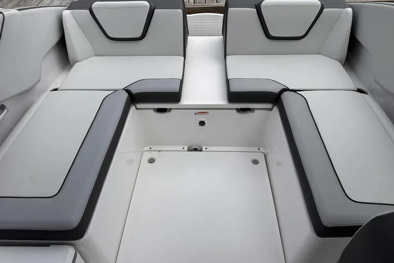 Slide: The Image of 2025 Yamaha Boats AR250 interior seating with sleek, modern design and comfortable upholstery. - 28