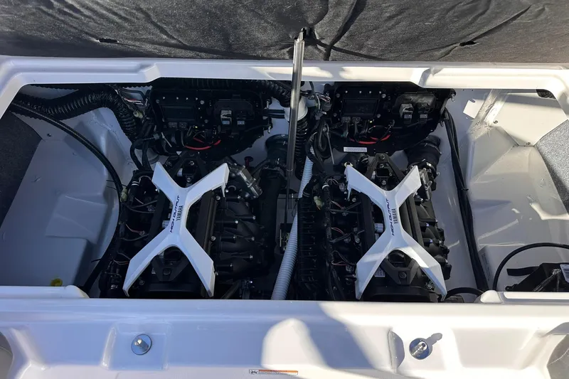 Slide: The Image of 2025 Yamaha Boats AR250 engine compartment with dual engines and components. - 29