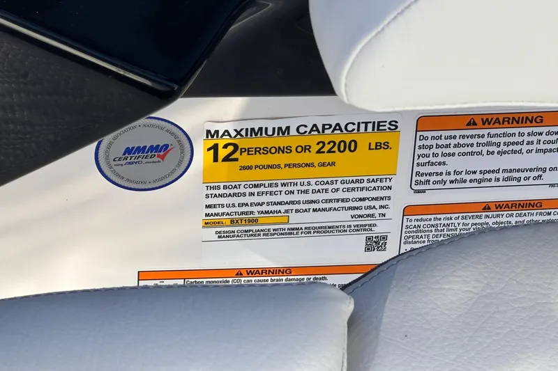 Slide: The Image of Yamaha Boats AR250 2025 capacity label, 12 persons or 2200 lbs, safety warnings visible. - 7