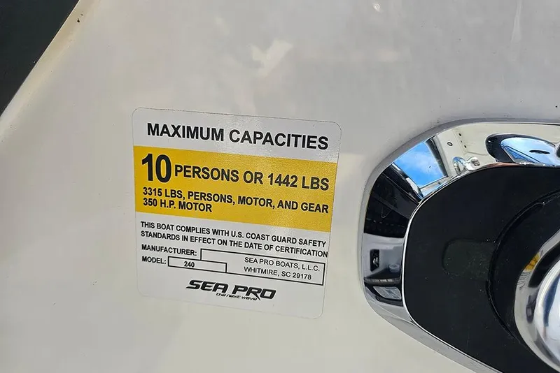 Slide: The Image of Sea Pro 240 Dual Console Sport 2026 capacity label, 10 persons or 1442 lbs, 350 HP motor. - 25