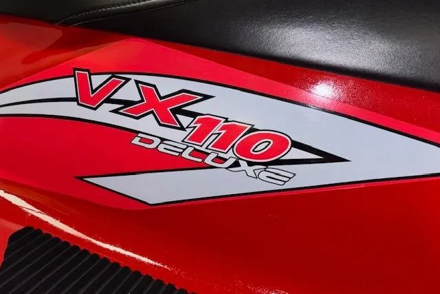 Slide: The Image of 2005 Yamaha WaveRunner VX 110 Deluxe logo on red body. - 14