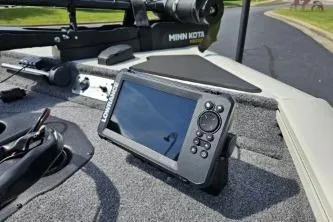 Slide: The Image of 2025 Tracker Pro Team 190 TX Tournament Edition boat with Mercury outboard motor. - 2