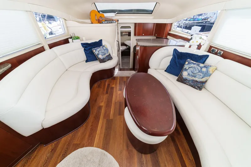 Slide: The Image of Luxurious interior of 2005 Sea Ray 390 Motor Yacht with elegant seating and decor. - 20