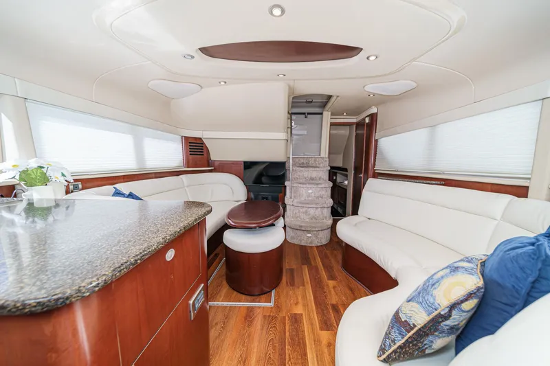 Slide: The Image of Luxurious interior of 2005 Sea Ray 390 Motor Yacht with elegant seating and modern design. - 21