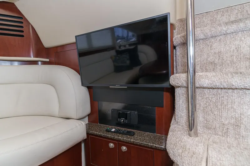 Slide: The Image of Interior of 2005 Sea Ray 390 Motor Yacht with TV and seating area. - 25