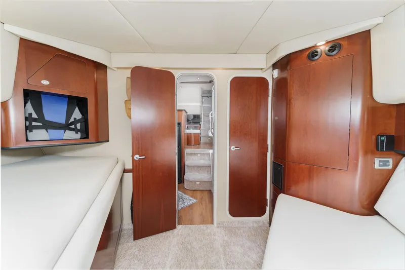Slide: The Image of Interior of 2005 Sea Ray 390 Motor Yacht with wood paneling and modern design. - 31