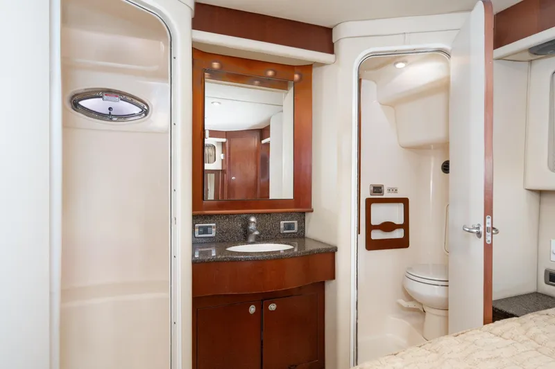 Slide: The Image of 2005 Sea Ray 390 Motor Yacht bathroom with sink, mirror, and toilet. - 37