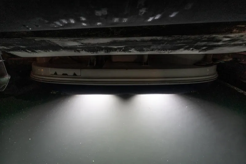 Slide: The Image of Underwater lights illuminating beneath 2005 Sea Ray 390 Motor Yacht at night. - 40