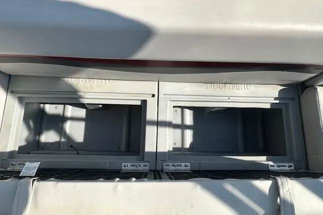 Slide: The Image of Interior view of a 2000 Sweetwater 2019 EL boat storage compartments. - 10