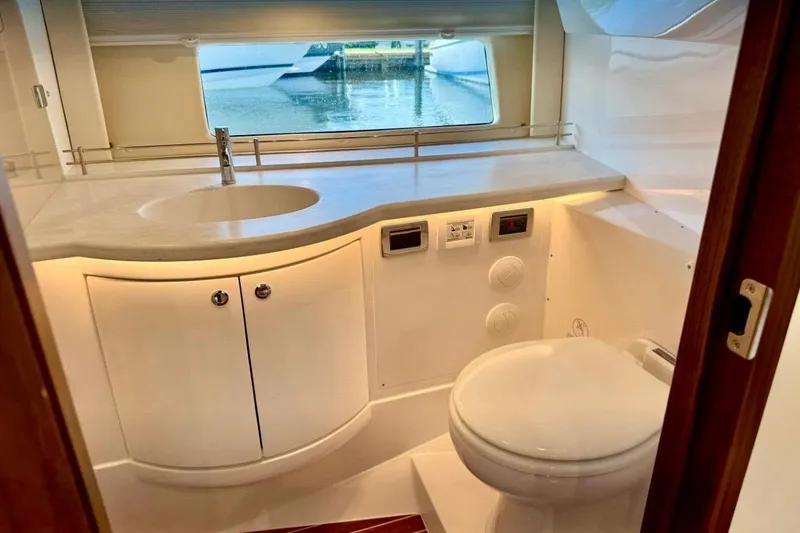 Slide: The Image of Luxurious bathroom interior of 2026 Intrepid 50 yacht with modern fixtures and scenic window view. - 16