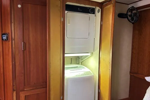 Slide: The Image of Stacked washer and dryer in 2001 Crosswater Passagemaker 49 boat interior. - 16