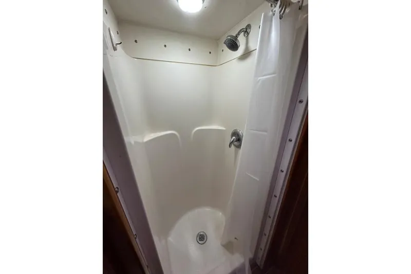 Slide: The Image of Compact shower area in 2001 Crosswater Passagemaker 49 boat. - 21