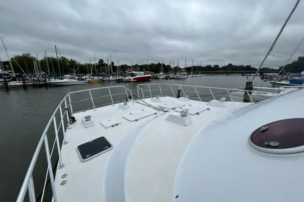 Slide: The Image of Bow view of 2001 Crosswater Passagemaker 49 yacht docked at marina. - 31