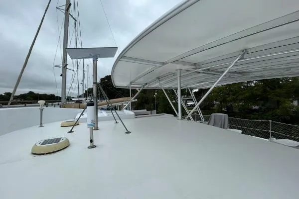 Slide: The Image of 2001 Crosswater Passagemaker 49 yacht deck with canopy and equipment. - 32