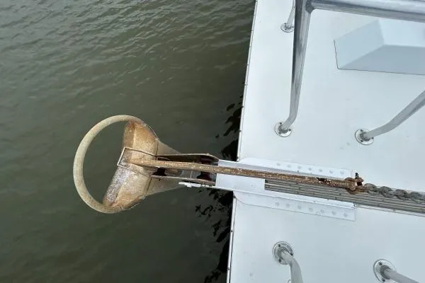 Slide: The Image of Anchor of 2001 Crosswater Passagemaker 49 yacht on calm water. - 42