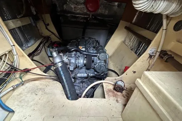 Slide: The Image of Engine room of 2001 Crosswater Passagemaker 49 boat, showcasing mechanical components. - 51