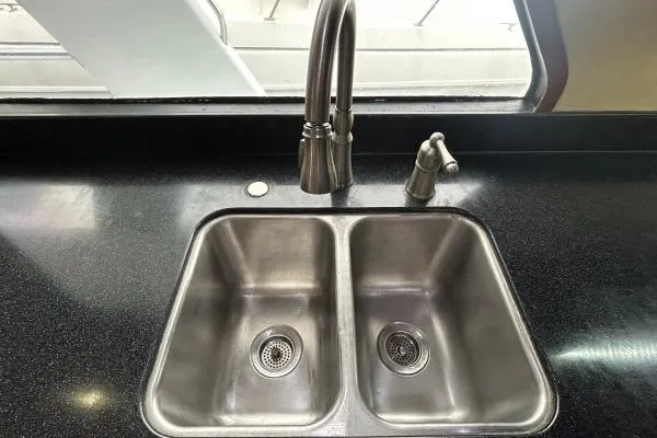 Slide: The Image of Stainless steel double sink with modern faucet on Crosswater Passagemaker 49 yacht, 2001 model. - 7