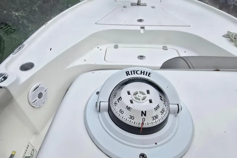 Slide: The Image of 2023 Key West 188 Bay Reef boat with Ritchie compass on dashboard. - 19