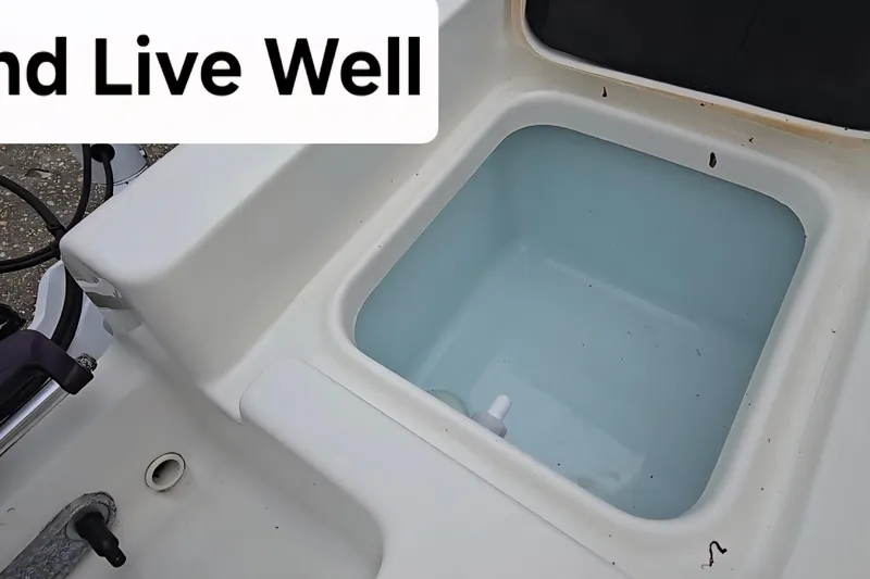 Slide: The Image of Live well on 2023 Key West 188 Bay Reef boat, filled with water. - 26