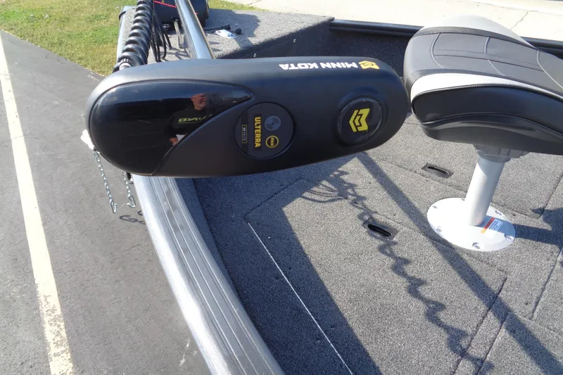 Slide: The Image of Minn Kota Ulterra motor on 2026 Lund 1650 Rebel XL SS boat deck. - 4