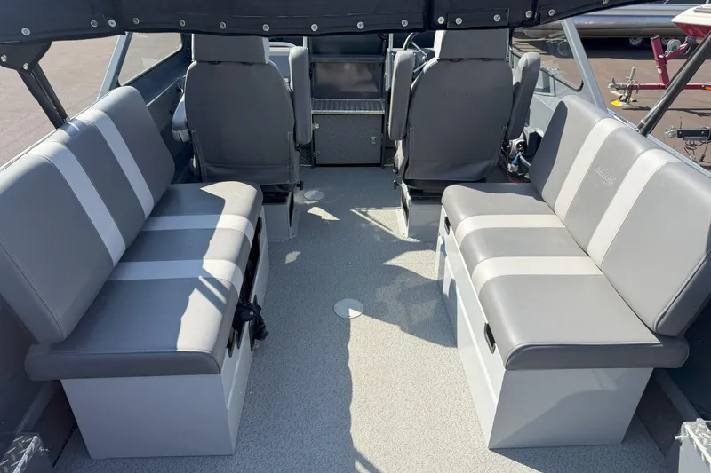 Slide: The Image of Interior of 2021 Hewescraft 210 Sea Runner ET boat with gray seating. - 8