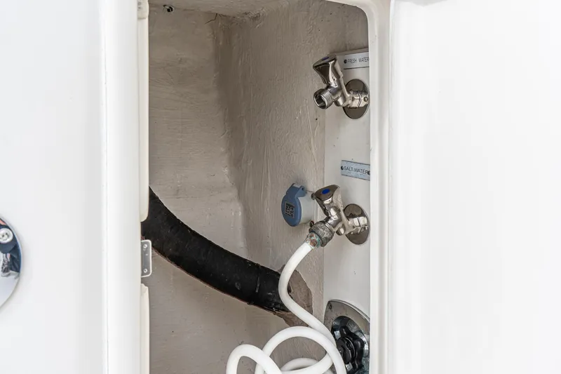 Slide: The Image of Water connections on 2009 Riviera 47 Open Flybridge Series II yacht. - 27