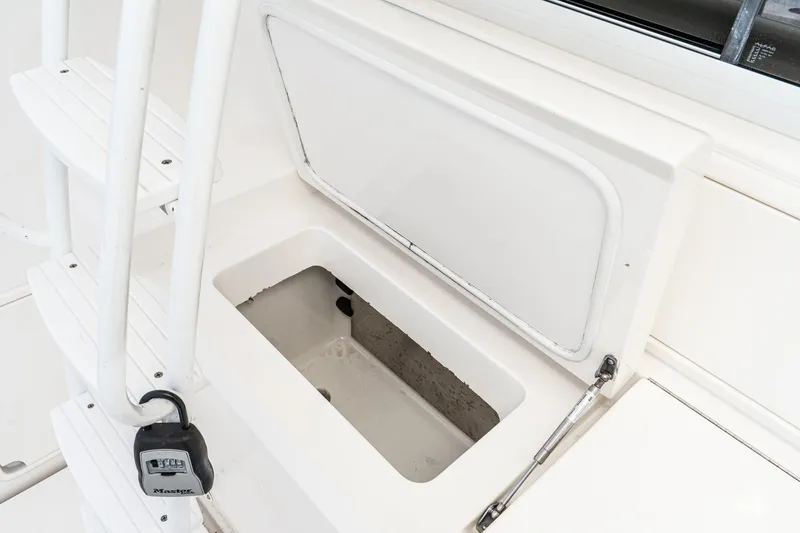 Slide: The Image of Open storage compartment on 2009 Riviera 47 Open Flybridge Series II yacht. - 30