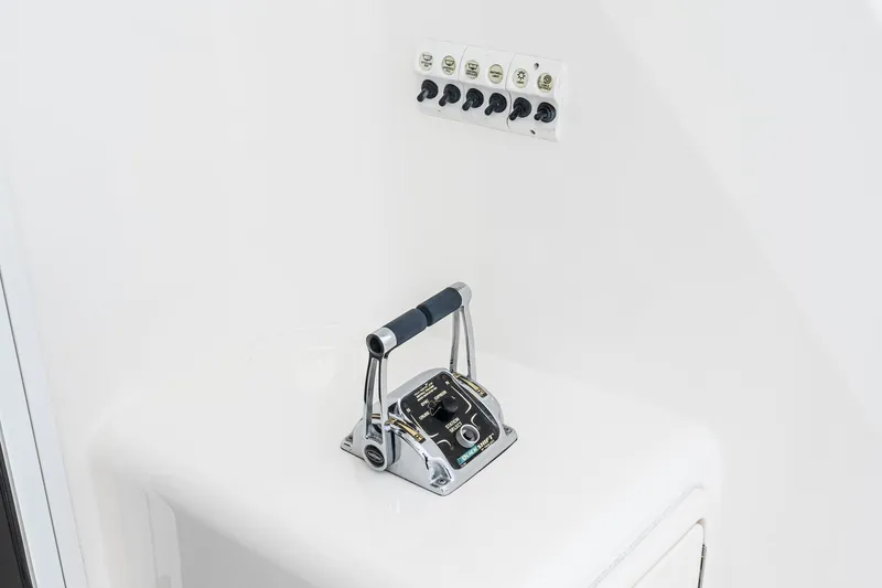 Slide: The Image of Control panel and throttle of 2009 Riviera 47 Open Flybridge Series II yacht. - 31