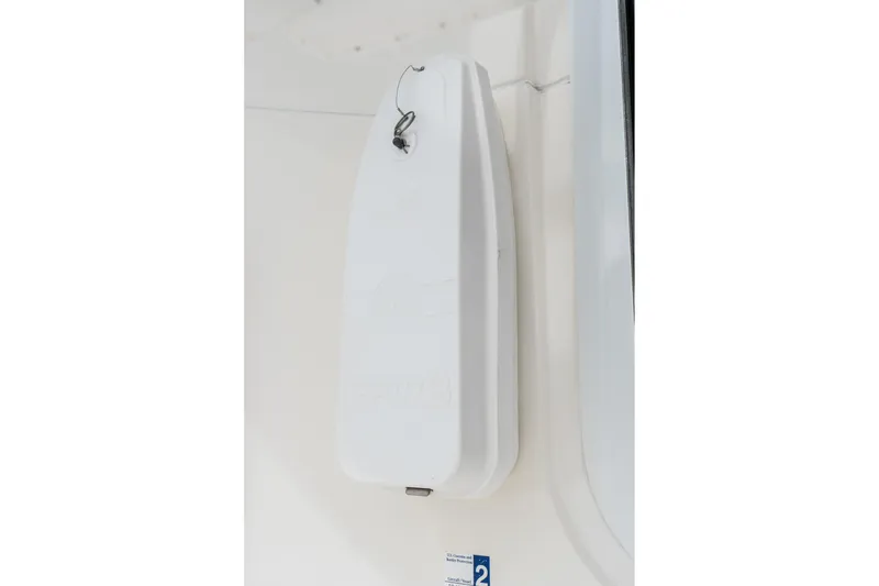 Slide: The Image of White life raft container on 2009 Riviera 47 Open Flybridge Series II yacht. - 34