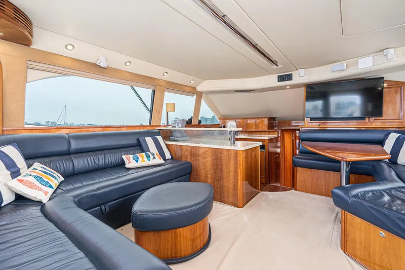 Slide: The Image of Luxurious interior of 2009 Riviera 47 Open Flybridge Series II yacht with leather seating. - 36